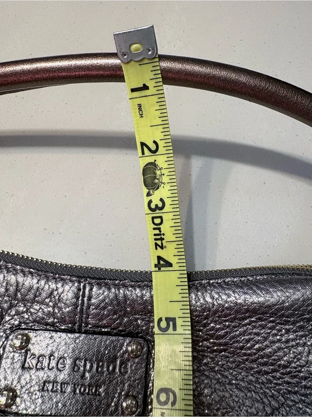 Kate Spade Janaya shiny silver hobo bag